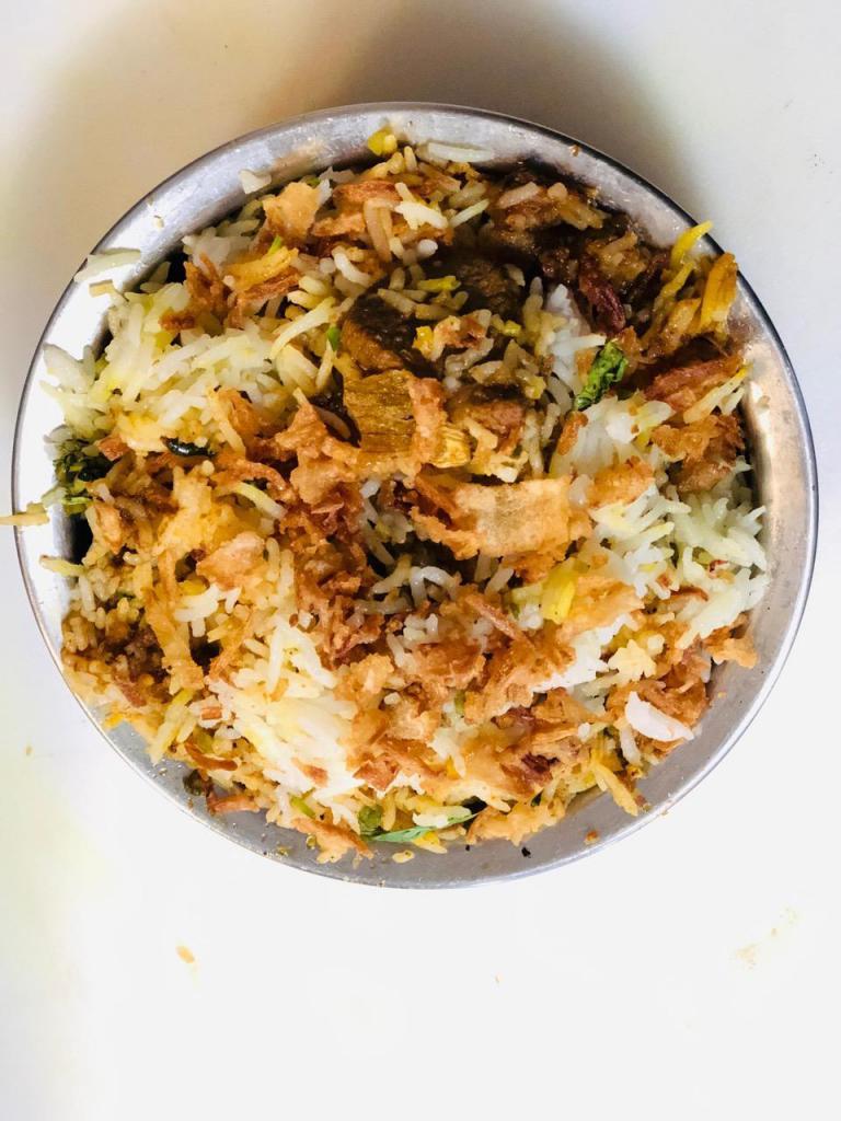 R3. Lamb Biryani · Cooked aromatic basmati rice, richly flavored saffron, herbs and spices. Served with raita. Gluten free.