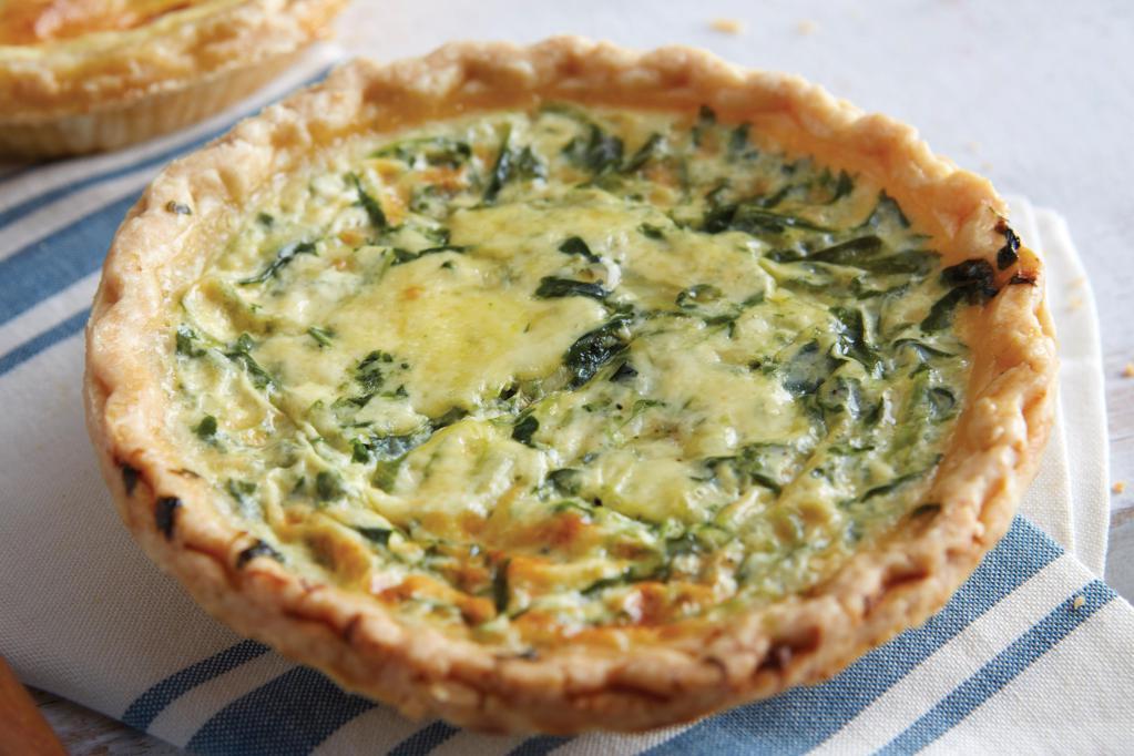 Quiche Florentine · House-made with baby spinach, tomato, mozzarella, and aged Parmesan.