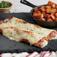 Ham & Swiss Crêpes · Thick-cut ham and melted Swiss cheese topped with a creamy mornay cheese sauce.
