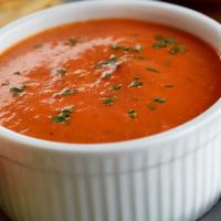 Bowl of Tomato Basil Soup · A creamy blend of vine-ripened tomatoes and fresh basil.