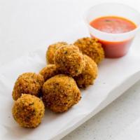 Mozzarella Balls · 8 seasoned and lightly-fried mozzarella balls.