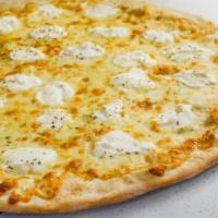 White Pie · hand stretched pizza topped with mozzarella, ricotta, and olive oil sprinkled with oregano.