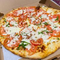 Personal Pizza ala Clino · Fresh mozzarella, sun-dried tomato, pesto and tomato sauce.