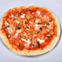Margherita Pizza · Fresh mozzarella, basil and marinara.
