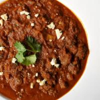 Lamb Rogan Josh · Lamb cooked with gravy based on brown onions, yogurt, garlic, ginger and other spices