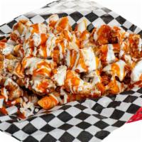 Kiki's Fries with Chicken · Mozzarella cheese, Buffalo sauce, ranch and blue cheese.