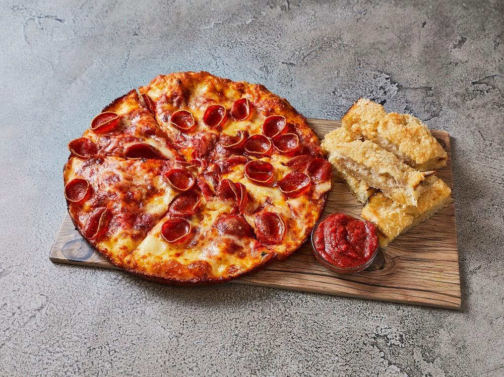 Pizza and Bread Special · 1 large 1-topping pizza and breadsticks or cinnamon sticks. Make it cheesebread for an additional charge.