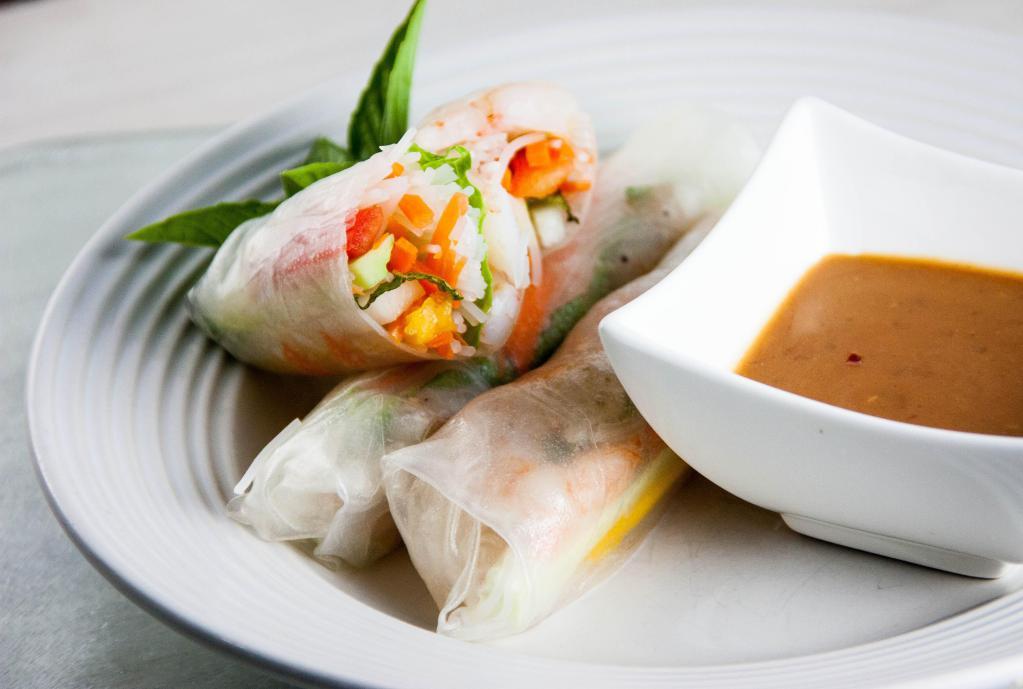  6B. Shrimp Summer Roll (2 pieces ) · Vietnamese fresh rice paper-wrapped roll stuffed w. Shrimp, lettuce, basil, papaya salad, cucumber and rice vermicelli noodle.