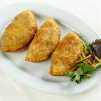 9. Malaysia Curry Puff  (1  Piece) · Curry potatoes, onion, and green pea in puff pastry. Spicy
