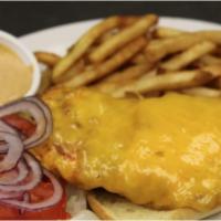Southwestern Chicken Sandwich · Fried chicken breast basted with buffalo sauce and smothered with melted cheddar. Served wit...