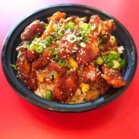 8. Chicken & Rice Bowl · Homemade Chicken Katsu (Japanese style fried chicken breast) with katsu sauce, served over F...