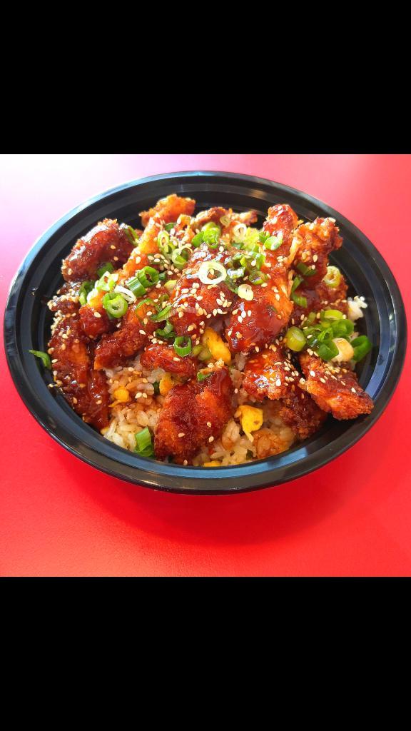 8. Chicken & Rice Bowl · Homemade Chicken Katsu (Japanese style fried chicken breast) with katsu sauce, served over Fried Rice.