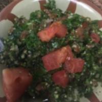2. Tabouli Salad · Chopped parsley, tomatoes, onions, cracked wheat, lemon juice and olive oil.