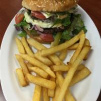 8. Shish Lamb Burger · Fresh lamb and beef patty served with our Shish specialty sauce in a bun. Add cheese for an ...