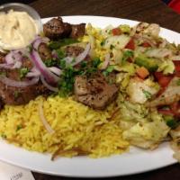 6. Gyro · A mix of beef and lamb cooked to perfection. Served with shish specialty tzatziki sauce and ...