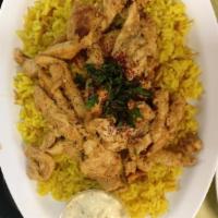 8. Chicken Shawarma · Tender chicken breast thinly sliced, seasoned and marinated with our authentic shawarma spic...