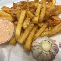 Garlic Fries · French Fries fried and tossed with Shish Grill special Garlic sauce