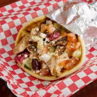 Chicken Greek Pita · Grilled chicken, lettuce, tomatoes, olives, beets, pepperoncini, onions, cucumbers and Greek...