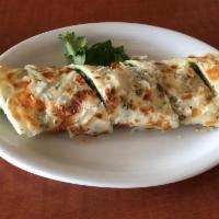 String Bean Roll (1 roll / 2 rolls) 四季豆捲餅 · String beans rolled in soft and flaky pancake with green onion, cilantro plus sweet and savo...
