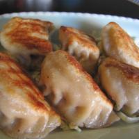 Chicken Potstickers (6 pcs)手工鸡肉煎饺 · Pan fried house made dumpling with all chicken fillings. 手工鸡肉煎饺