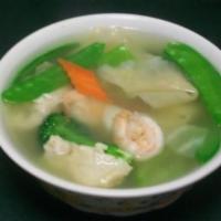 Wor Wonton Soup · Chicken Wonton, shrimp, sliced white meat, snow pea and baby Bok Choy in homemade style chic...
