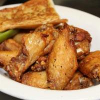 Dirty Wings · Bone-in wings breaded or naked. With your choice of flavor.