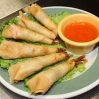 Dirty Fingers · Well seasoned, crispy shrimp rolls served with house-made sweet and sour sauce.