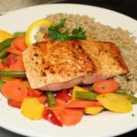 Grilled Salmon · Grilled Atlantic salmon served with rice and sauteed spinach.