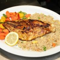 Blackened Catfish · Catfish fillet blackened with nine Cajun spices. Served with fried rice and mixed vegetables.