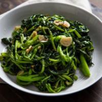 Broccoli Rabe · Served with sausage.