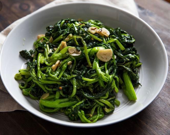 Broccoli Rabe · Served with sausage.