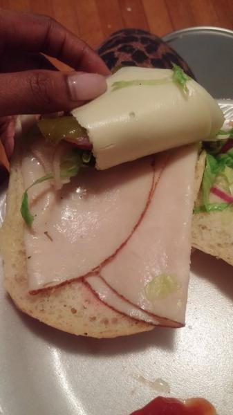 Turkey and Provolone Large Cold Sub · Served with lettuce, tomatoes, onions, oil and vinegar or mayo.