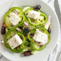 Greek Salad · Cucumber, tomato, onion, feta cheese, and olives.