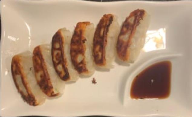 Gyoza · Japanese pan-fried dumpling.