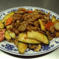 79. Pork in Hot Szechuan Garlic Sauce · Served with rice. Hot and spicy.