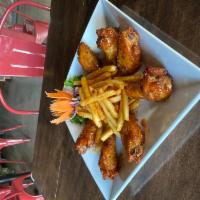 Swinging Chicken Jr. · 6 deep fried chicken wings marinated with Thai special recipe and dressing with sweet spicy ...