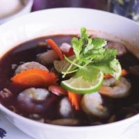 Dok Anchan Soup · The traditional Thai herbs “Dok Anchan or Butterfly Pea” mix with hot and sour sou, shrimps,...