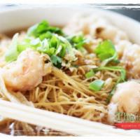 Wonton and Egg Noodle Soup · Thai comfort food in a bowl! Shrimp stuffed wontons, egg noodle, vegetable in a clear broth ...