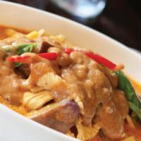 House Special Curry · Red curry well mixed with peanut sauce, broccoli, carrots, basil, eggplant and your choice o...