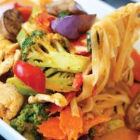 Jungle Noodle Curry · Rice noodle with red curry sauce, broccoli, carrot, cabbage, eggplant and basil leaves.