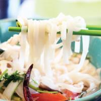Tom Kha Noodle Soup · Rice noodle in tom kha soup with mushroom, cabbage, onion, lemongrass and lime juice.