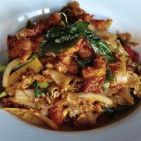 Nugget Pad Kee Mao · (Special of the month) Thai wide rice noodles stir-fried with nugget chicken, broccoli, carr...