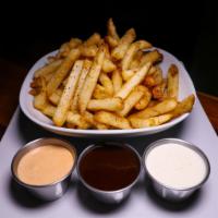 Pommes Frites · Fresh cut fries, peppered, Greek, garlic dill, Parmesan basil and signature sauce.