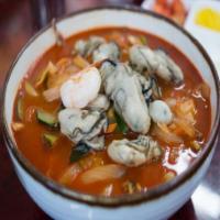 Spicy Oyster Champ Pong · Noodles with oyster vegetables in spicy soup.
The noodles and sauce are in separate containe...