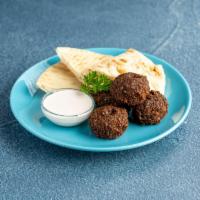 Falafel · Chickpea patties seasoned with garlic, cilantro, onions, parsley and herbs and fried to a cr...