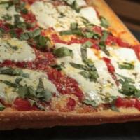 Grandma's Pizza · Hand crushed tomato, fresh mozzarella, basil, grated pecorino, oregano and extra virgin oliv...