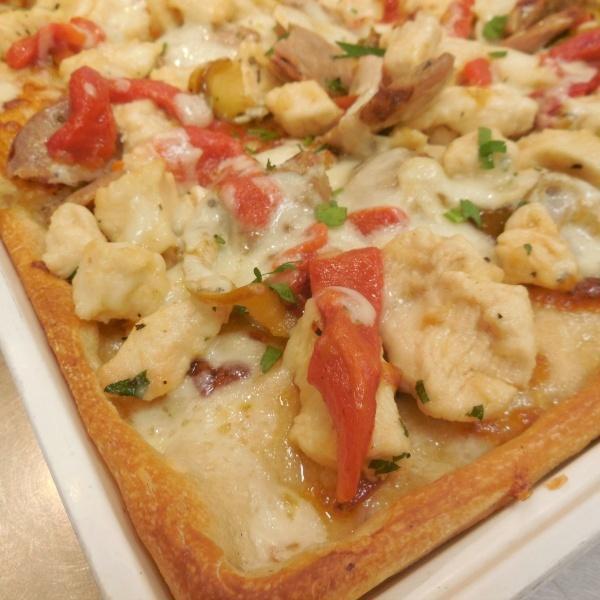 Chicken Scarpariello Pizza · Sauteed chicken, sweet sausage, hot and sweet peppers, garlic and mozzarella.