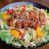 Toasted Sesame Chicken Salad · Choice of marinated chicken breast or crispy chicken strips with fresh romaine, cabbage, dic...