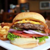 The Ranchhand Bacon Burger · Tillamook cheddar, thick peppered bacon, fried egg, lettuce, onion, tomato, pickle, and BOB ...