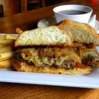 Angus Burger Dip · Painted hills chuck patty, Swiss cheese, and caramelized onions on a garlic-buttered French ...